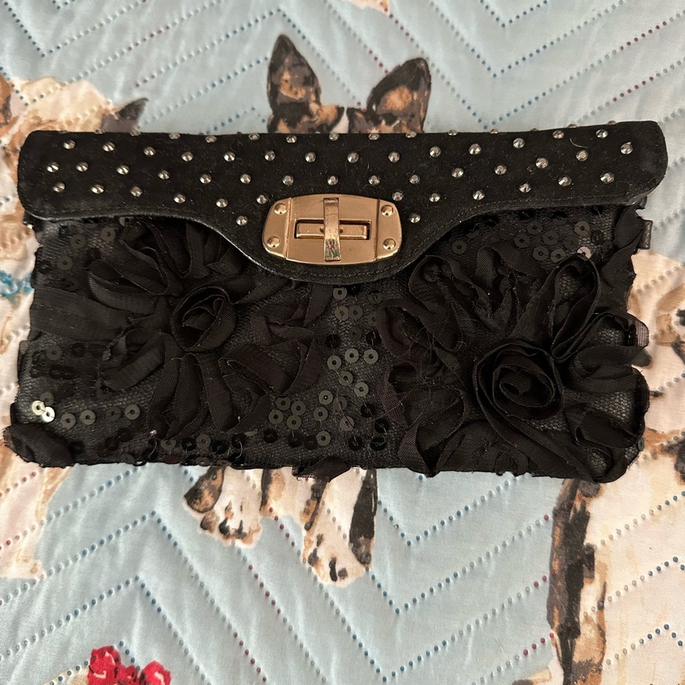 Elegant Black Clutch with Floral Accents